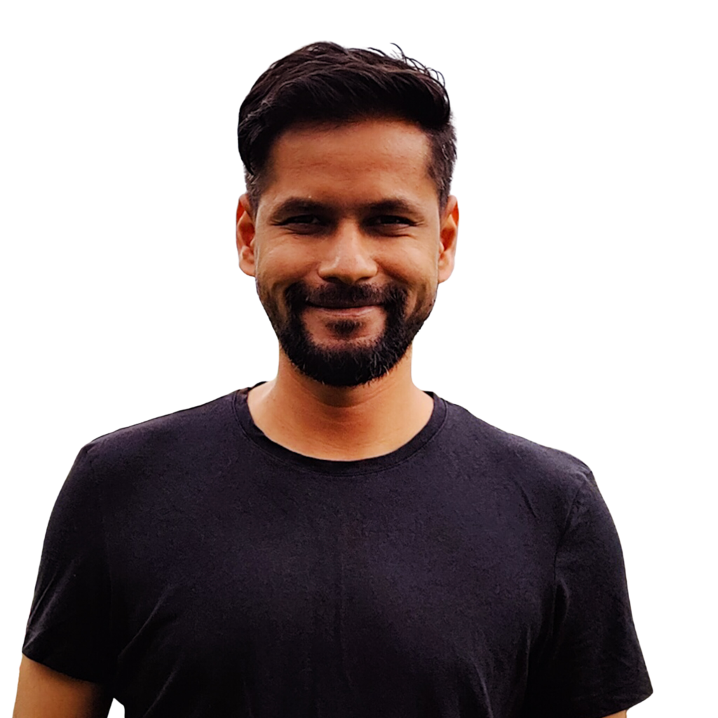 Head and Shoulder Photograph of Nishith Shah, Nishith is smiling and casually dressed in a black t shirt